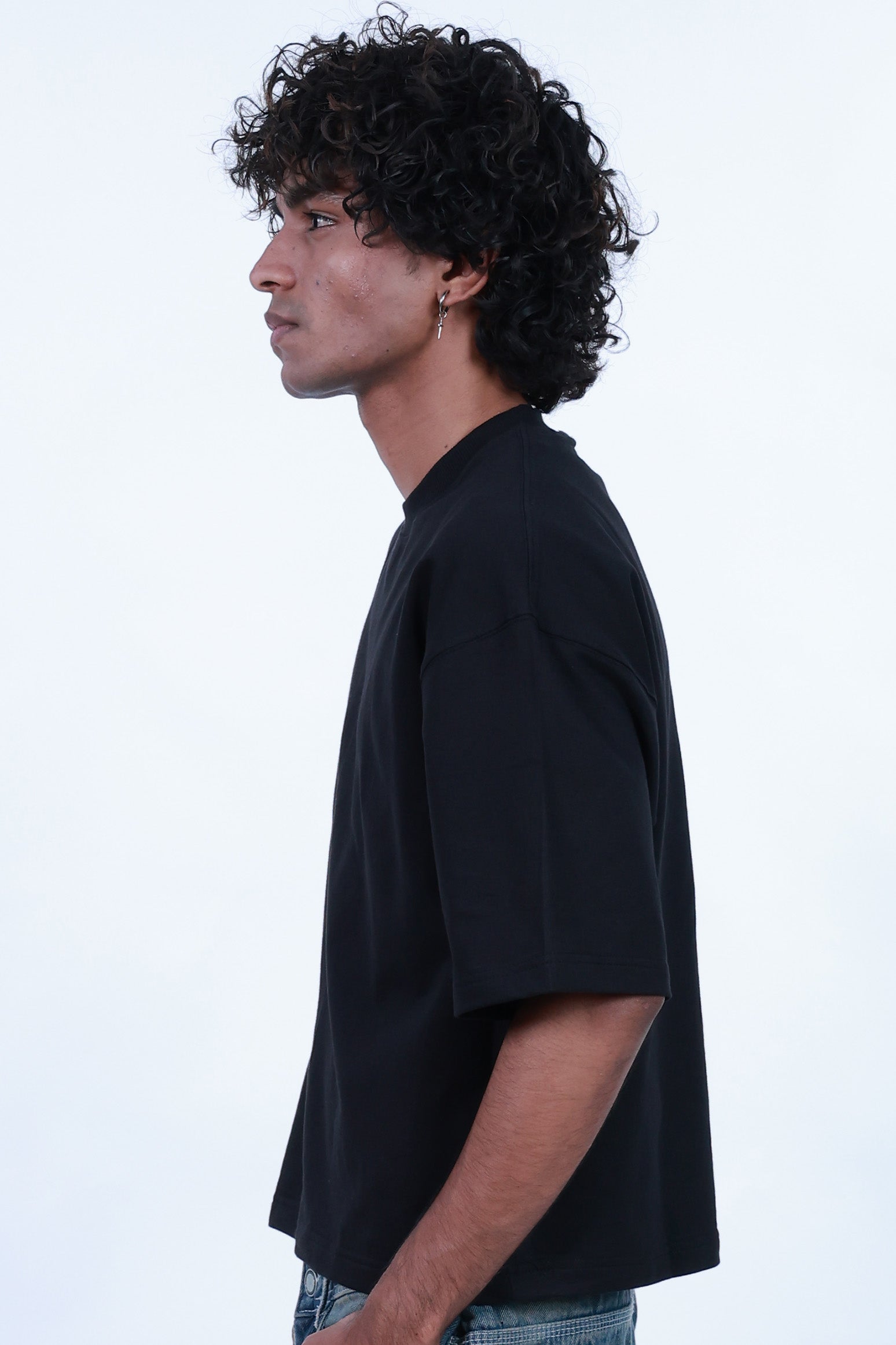 MoonOne Boxy Fit T-Shirt Black - Men's Side Pose | Boxy Fit Cotton Tee
